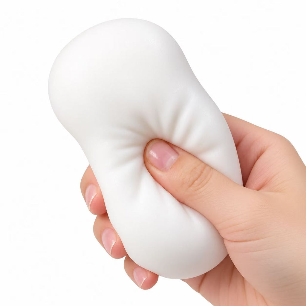 Bean Squishy Stress Ball in white held in hand