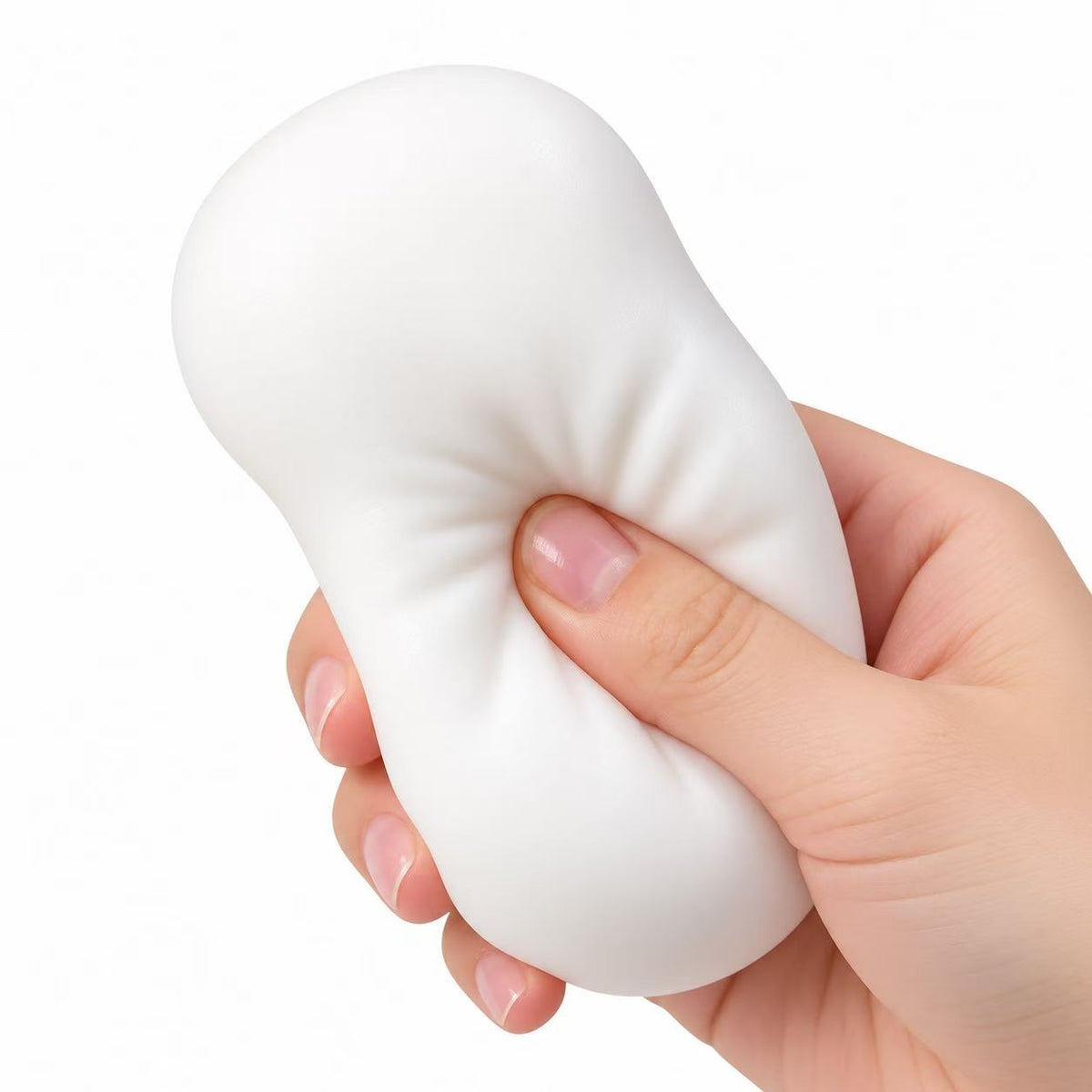 Bean Squishy Stress Ball in white held in hand