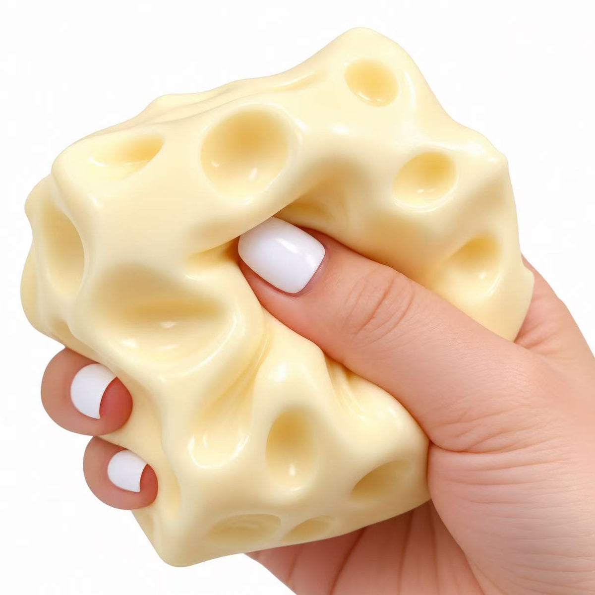 Cheese Squishy being squeezed in one hand showing super soft texture