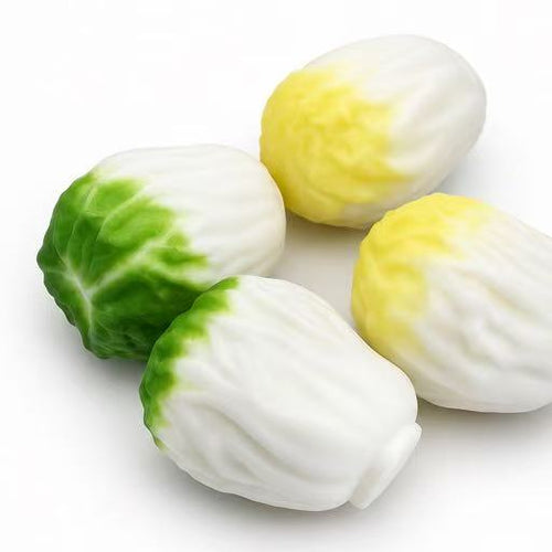 Crunchy Cabbage Squishy - green variant being squeezed in hand