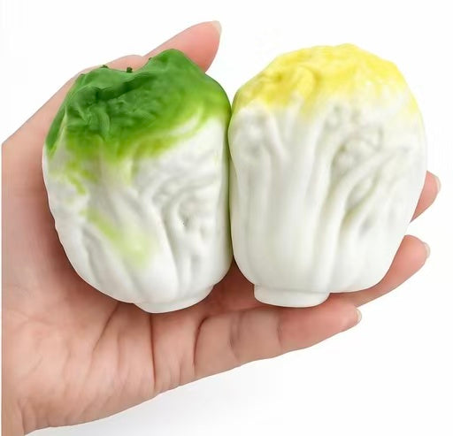 Crunchy Cabbage Squishy - bulk pile of green and yellow variants