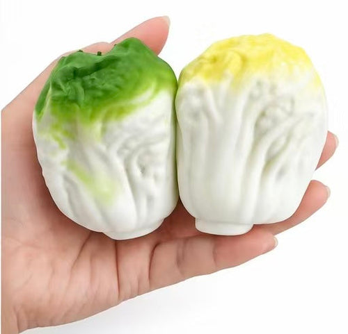 Crunchy Cabbage Squishy - bulk pile of green and yellow variants